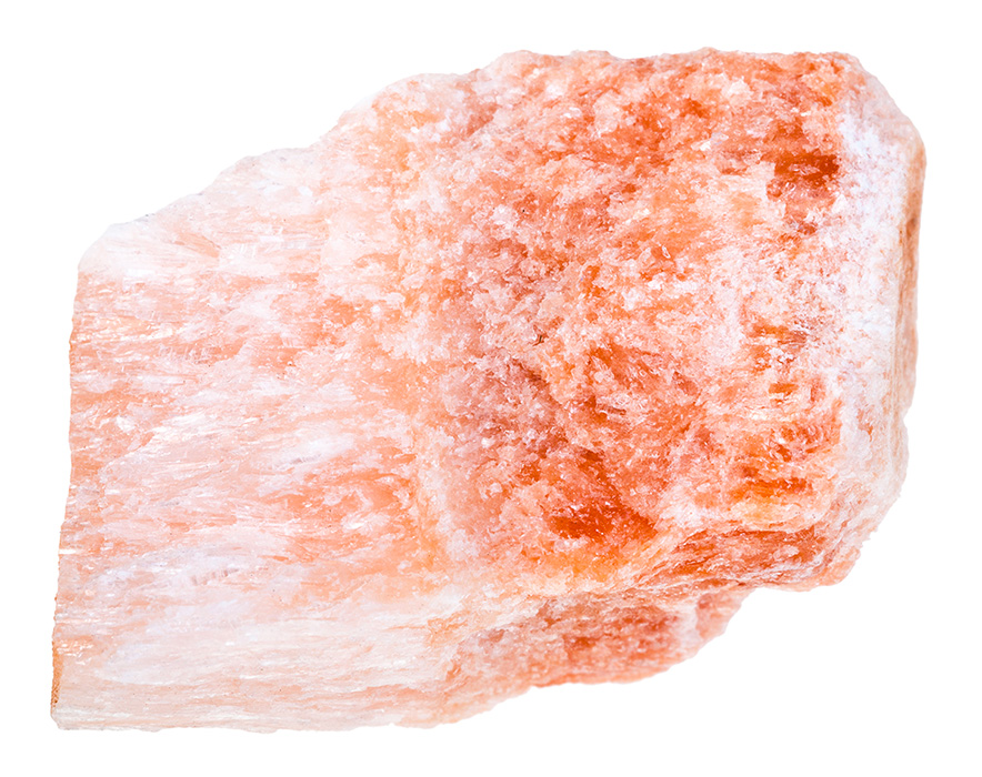 Piedra selenita en bruto de tonos rojizos